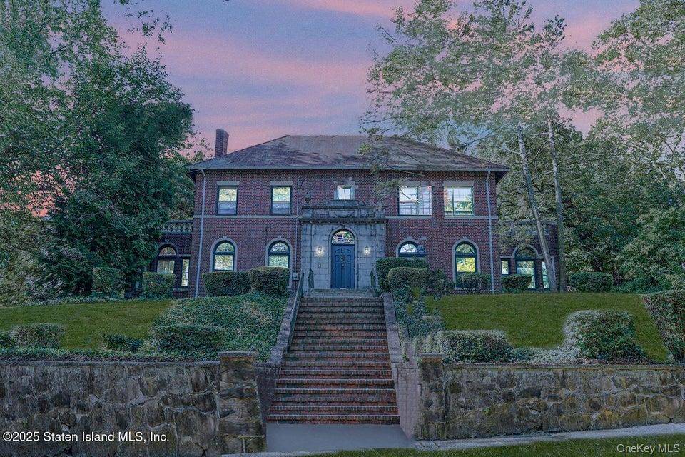 A Hilltop Estate in the Heart of Grymes Hill !