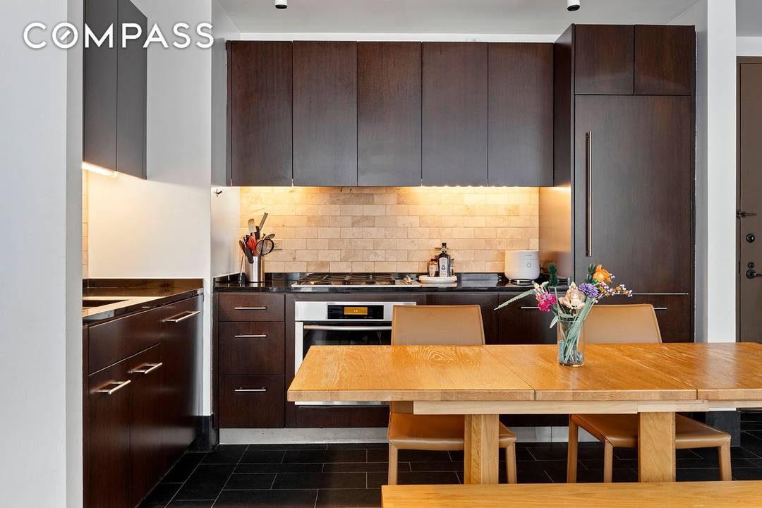 Elevated Downtown Living at 40 Broad Street Experience luxury and scale in this rarely available, expansive 2 bedroom, 2 bathroom residence at the renowned 40 Broad Condominium.