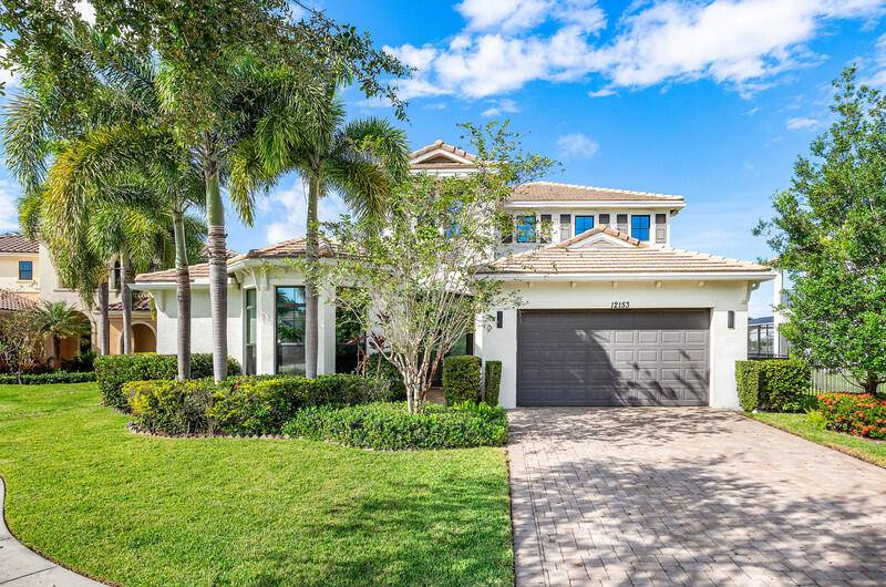 Discover a beautifully upgraded lakefront residence in the exclusive enclave of Boca Reserve.