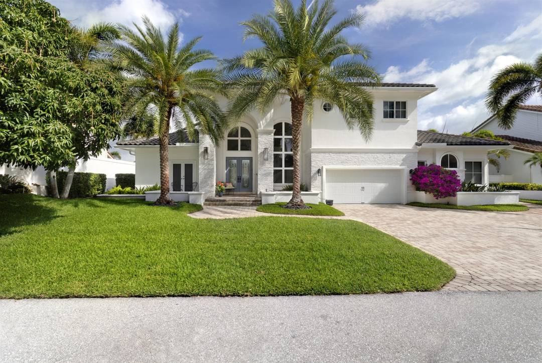 Experience the pinnacle of waterfront luxury in Delray's coveted Tropic Isle.