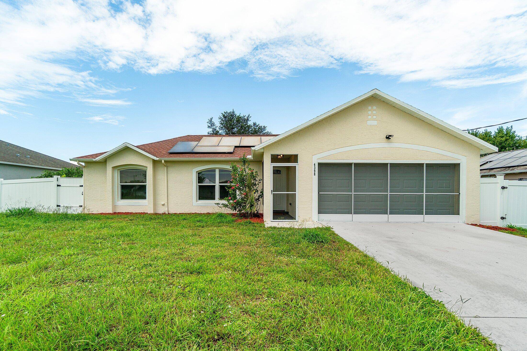 Beautifully renovated 3 bedroom, 2 bathroom home plus office featuring a stunning new kitchen with white cabinets, granite countertops, and stainless steel appliances.
