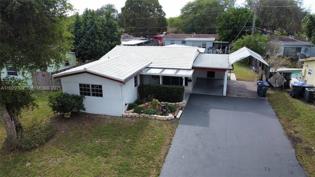 Solid CBS construction with a concrete roof, this well maintained 3 bedroom, 2 bath home is located in the desirable Driftwood Plaza community with no HOA and OK to lease.