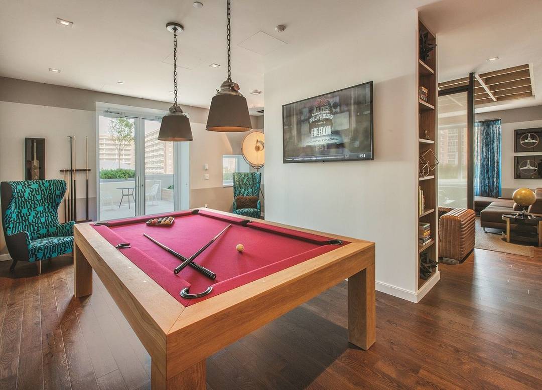 Bright 2 bedroom with over sized windows, a gourmet kitchen featuring stainless steel appliances and Caesarstone quartz counters, and an in unit washer dryer.