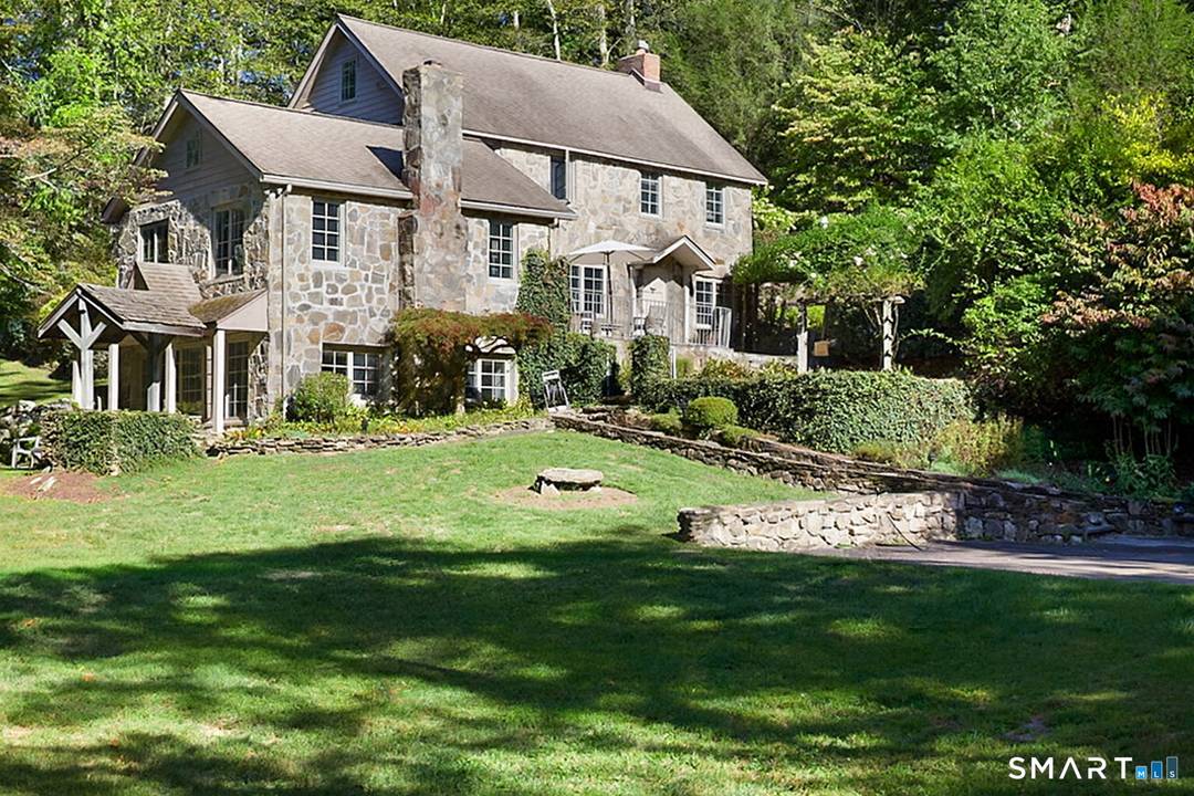 A rare offering in Westport, this antique stone home blending timeless character with modern updates.