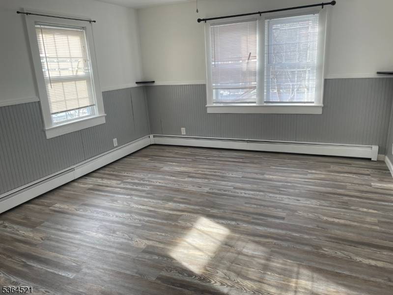 Spacious Renovated Two Family Home on a Quiet StreetDiscover this beautifully updated two family home, offering a huge 4 bedroom apartment upstairs with a brand new kitchen, a large living ...