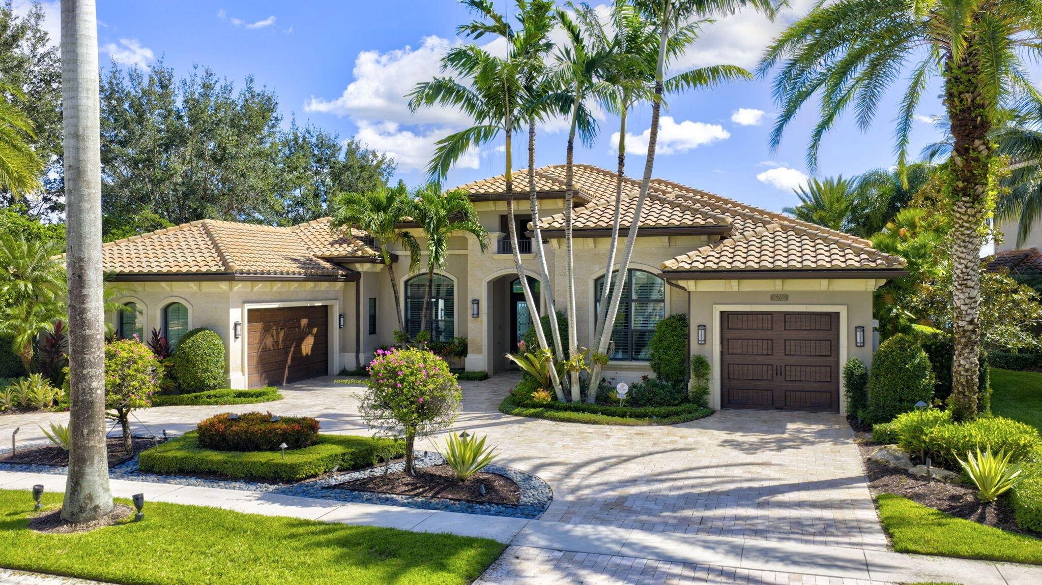 Welcome to a residence that defines luxury living in one of Boca Raton's most prestigious communities The Bridges.