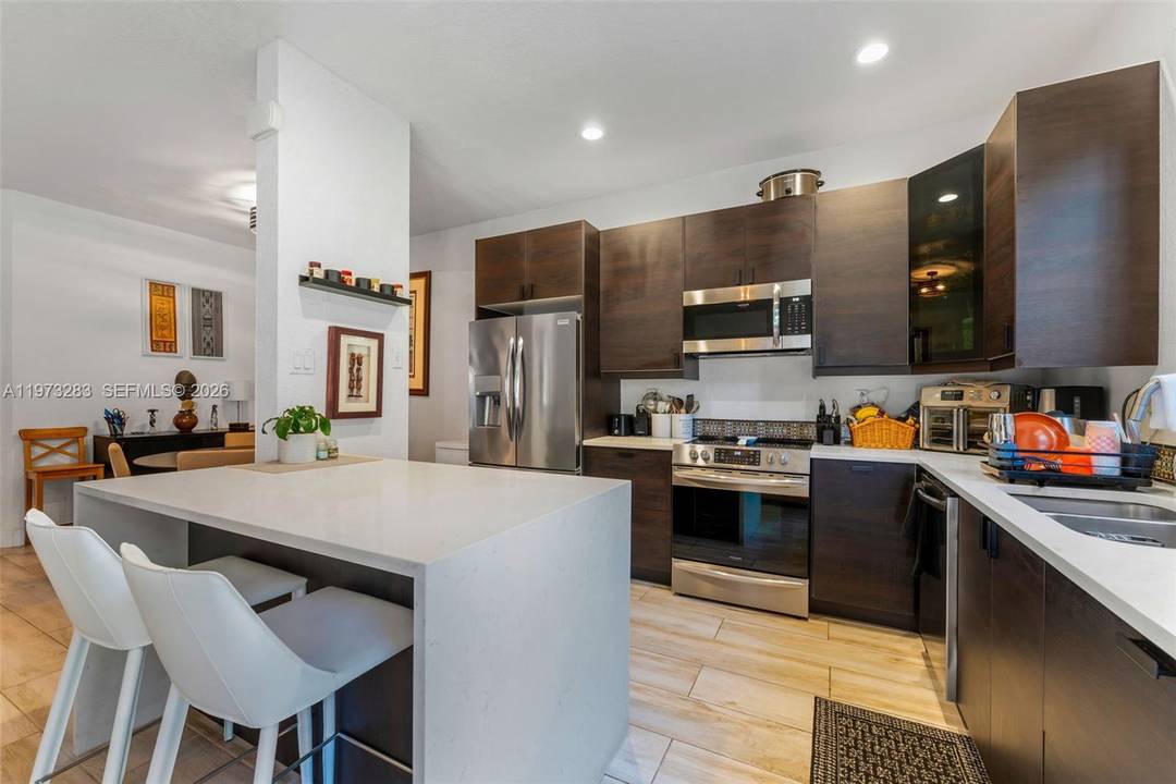 Welcome to this beautifully updated home featuring an open concept layout, modern finishes, and abundant natural light throughout.