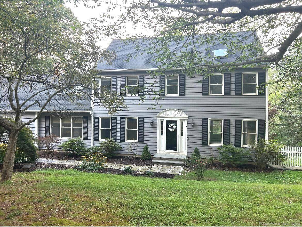 Beautifully updated Colonial style home that blends timeless character with fresh, modern finishes.