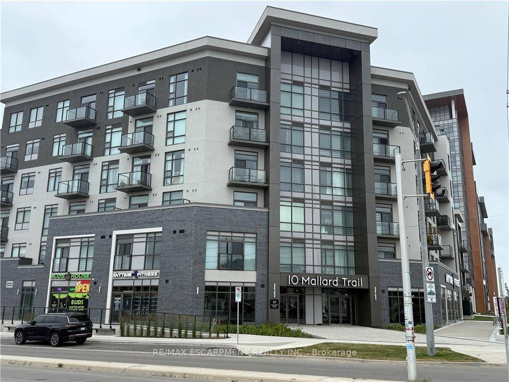 1 BEDROOM DEN, TREND BOUTIQUE condo located in trendy hot spot of Waterdown.