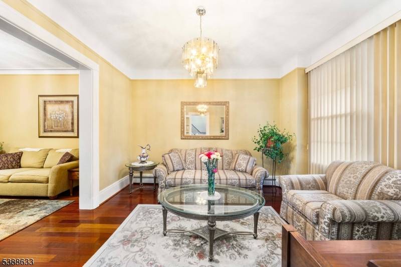 Welcome to this meticulous and well maintained home, a hidden gem in the beautiful town of West New York.