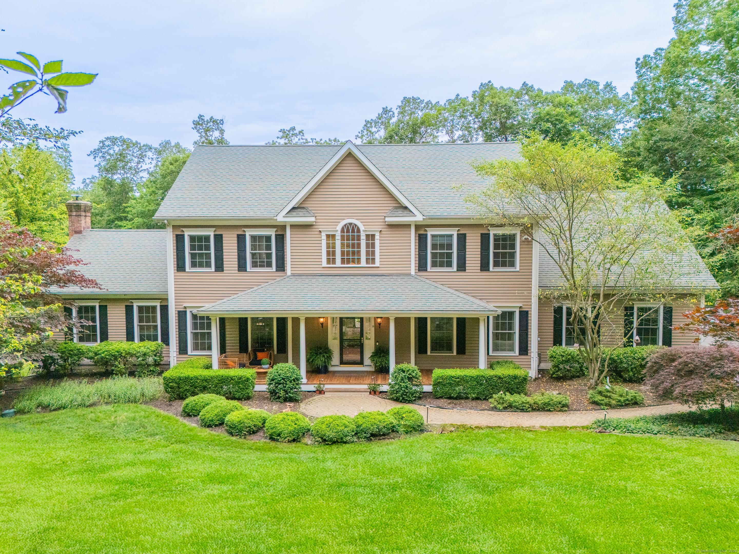 Welcome to your private 6, 000 square foot colonial estate, perfectly situated on 2.