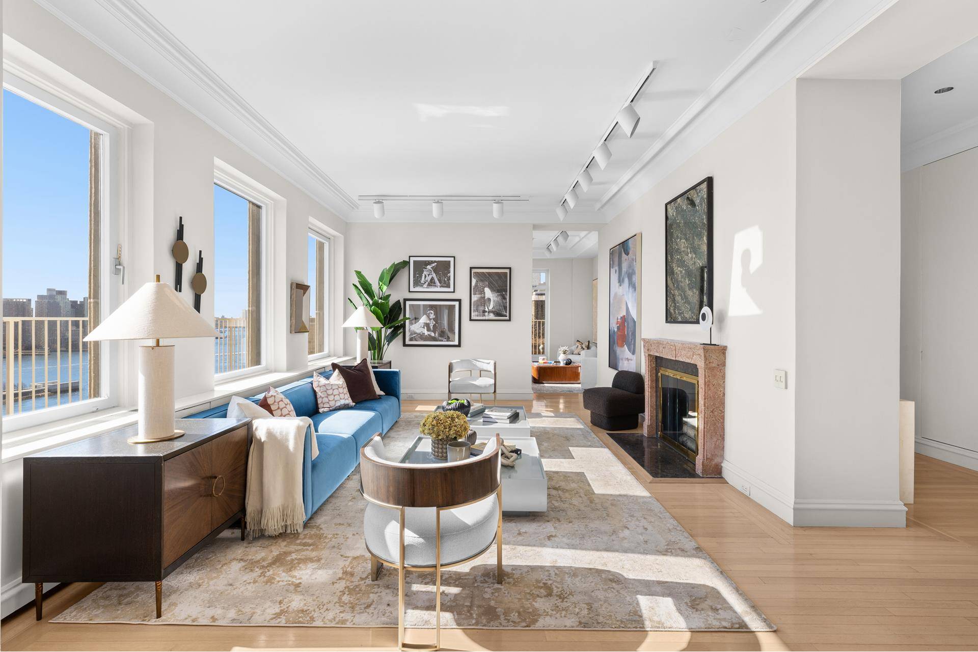 PENTHOUSE A RIVER HOUSE GEM Perched high above the East River with open sweeping views to the South, East and North, this magnificent terraced apartment with 10 ceilings and original ...