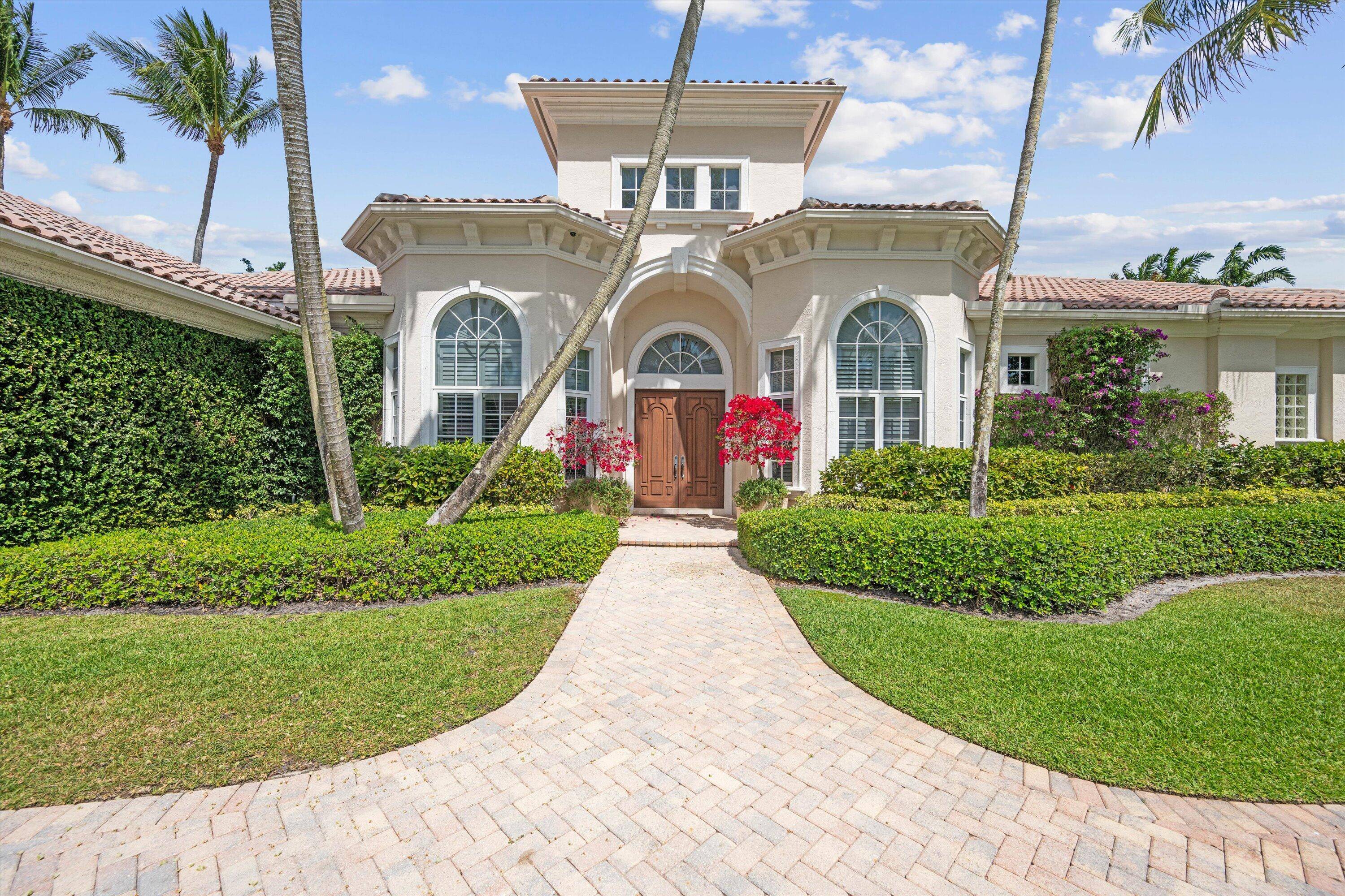Step into timeless elegance and modern luxury with this beautiful home in the exclusive, guard gated Mizner Estates enclave within Palm Beach Polo.