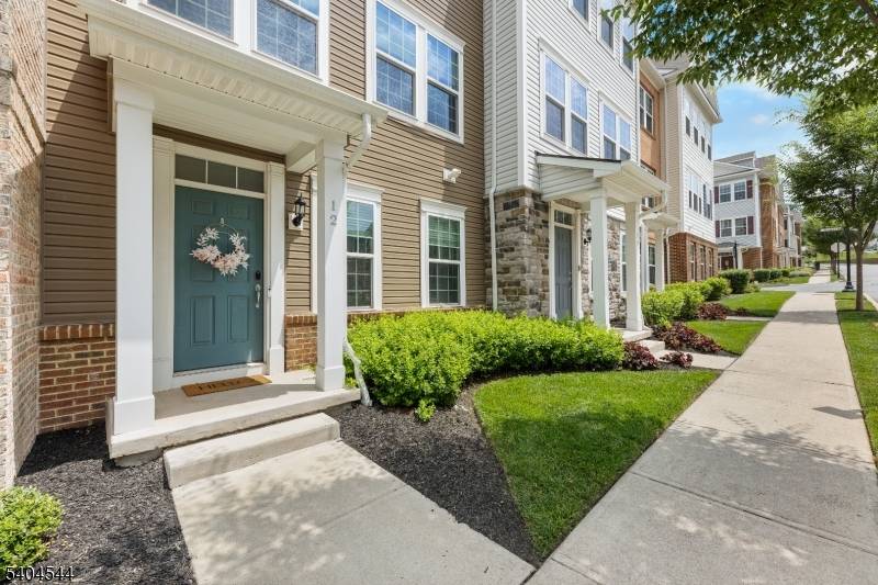 Welcome to the FINEST sought after Colonial Style Luxury townhomes in North of NJ located at Wesmont Station Community of Wood Ridge.