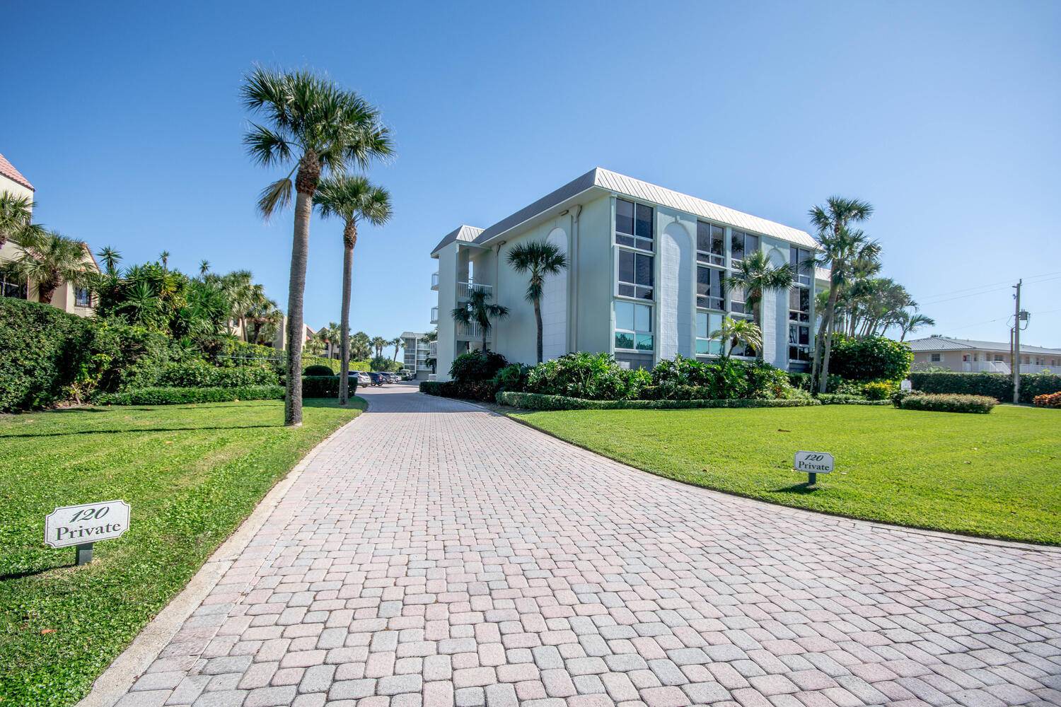 Coming Soon ! This oceanfront ground floor corner condo feels more like a private beachfront cottage.