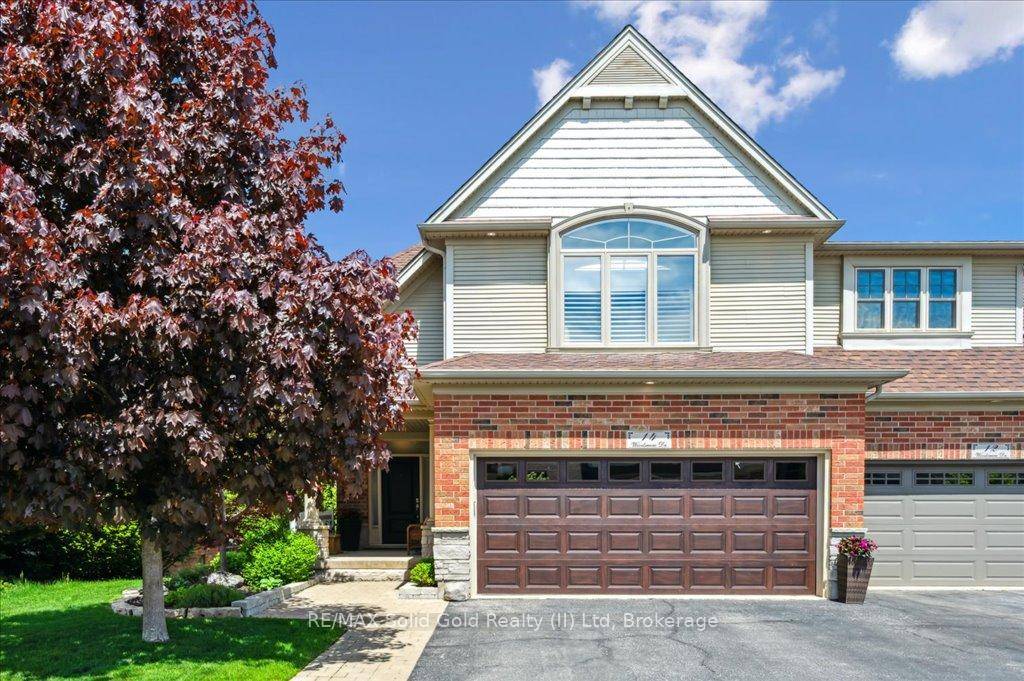 Stunning Doon Townhome ! End unit, finished walk out basement, backs onto trees.