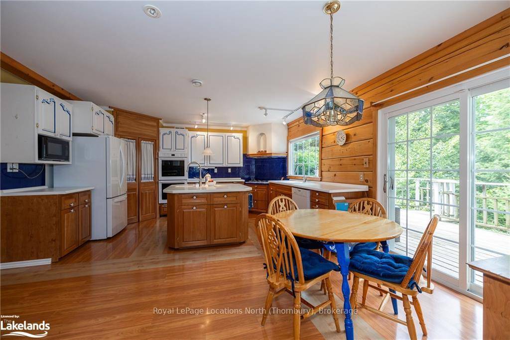 Hidden gem with private lake and spring fed pond, nestled on over 35 acres of forested property.