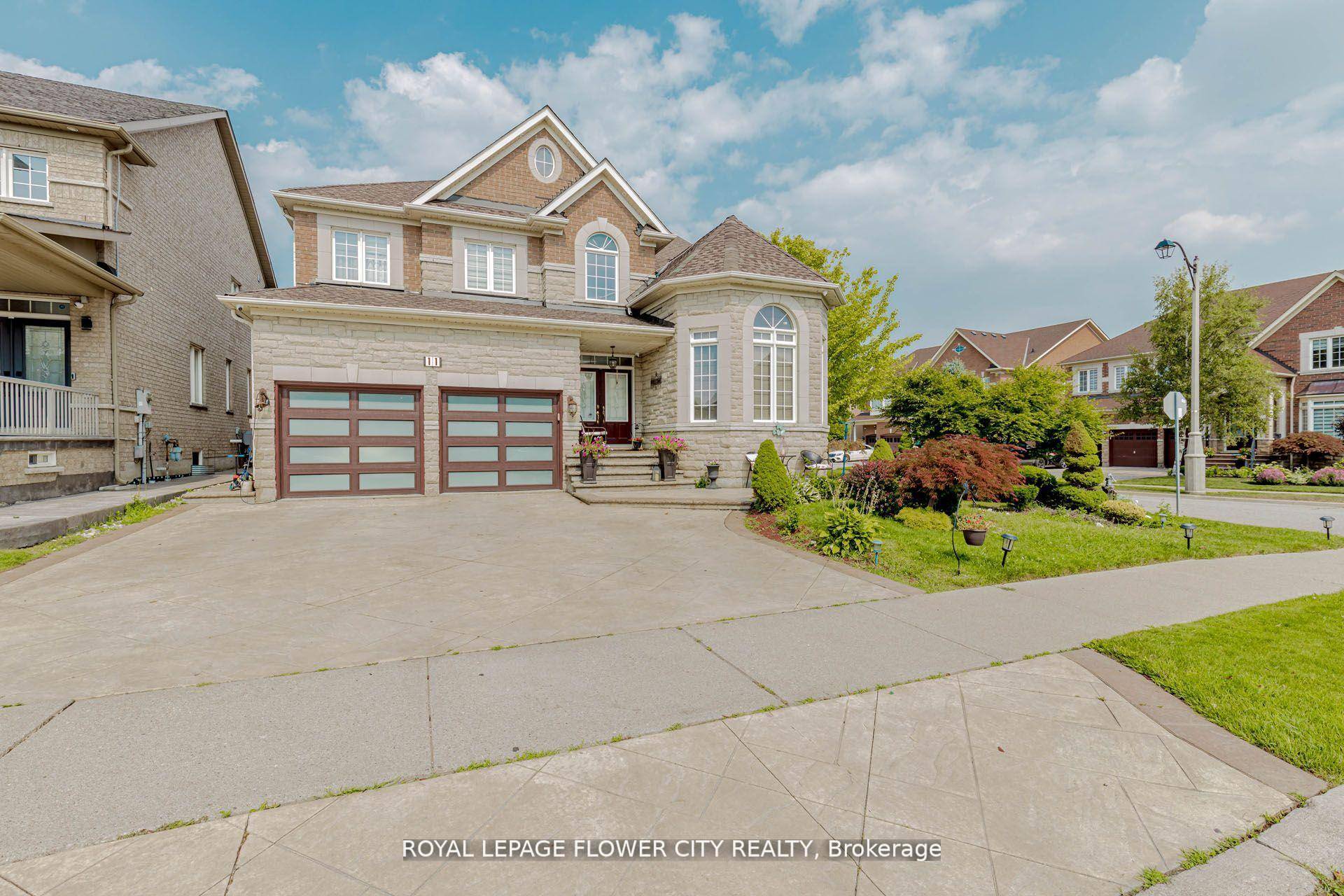 Welcome to this executive 4 2 bedroom home proudly situated on a 52 ft wide premium corner lot in the highly desirable McVean and Queen community of Brampton.