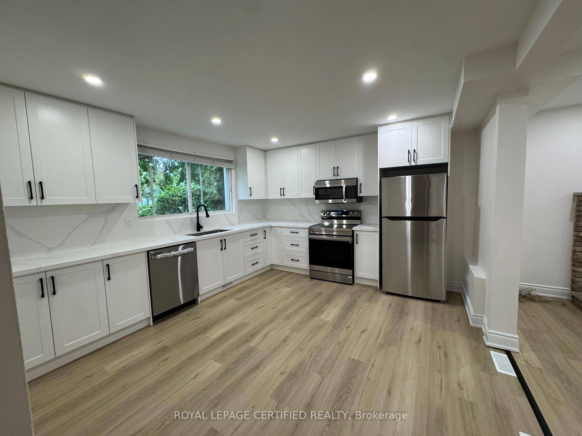 Stunning, newly renovated 2 bedroom ground level side unit in a legal two unit home in one of Oakvilles most desirable neighbourhoods.