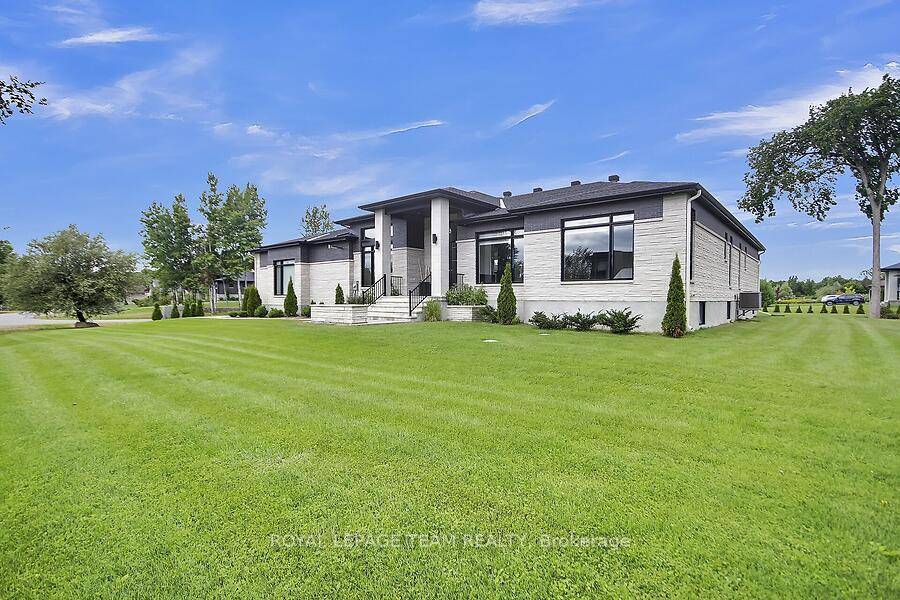 OPEN HOUSE SUNDAY, AUGUST 31ST 2 4PM This expansive custom built bungalow offers 6 bedrooms and 5 bathrooms, showcasing elegant wide plank oak hardwood flooring, oversized windows, and exquisite craftsmanship ...