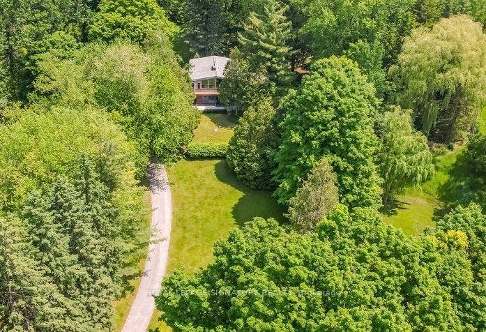 Unique Raised Bungalow Offering 2275 Sq Ft of Sun Filled, Functional Living Space.
