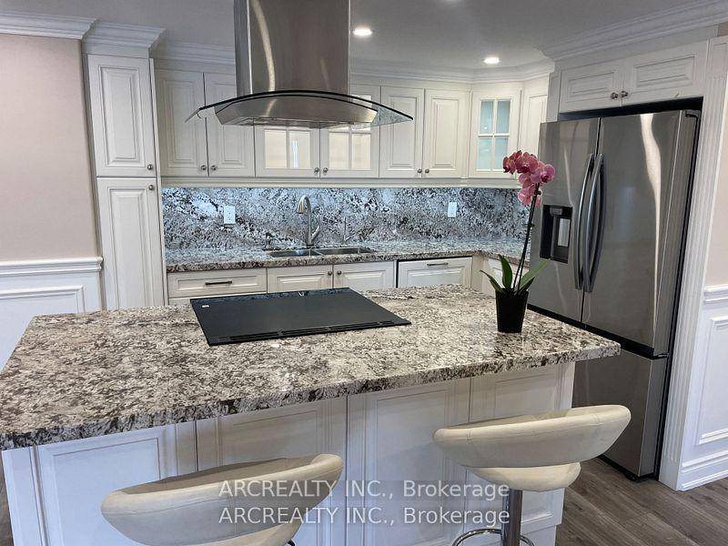 Gorgeous and Professionally Designed Corner Unit Rare Find Exceptional value.