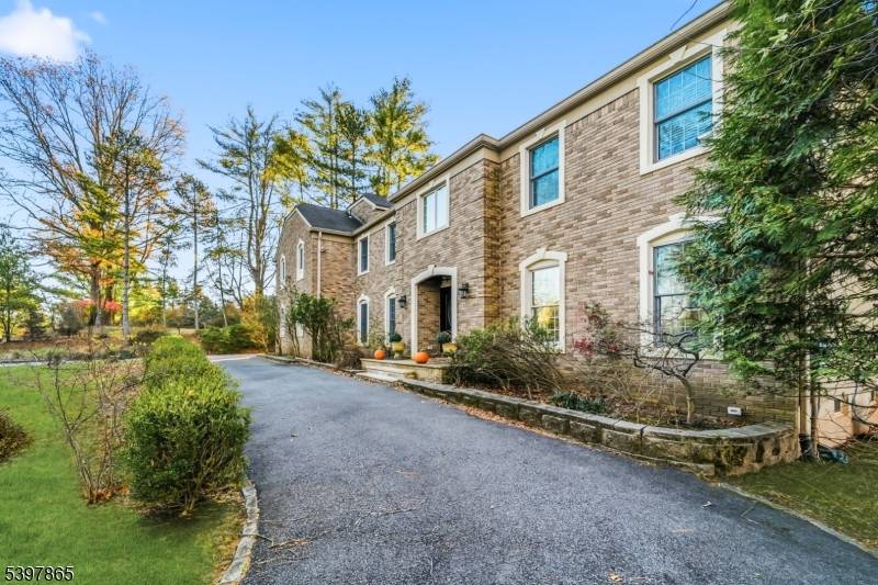 Welcome to this beautifully updated home on a quiet, tree lined street in the heart of Old Tappan.