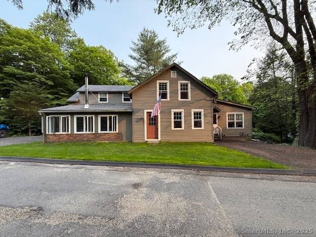 NOTE NEW PRICE POINT FOR THIS LOVELY WOODBURY RESIDENCE !