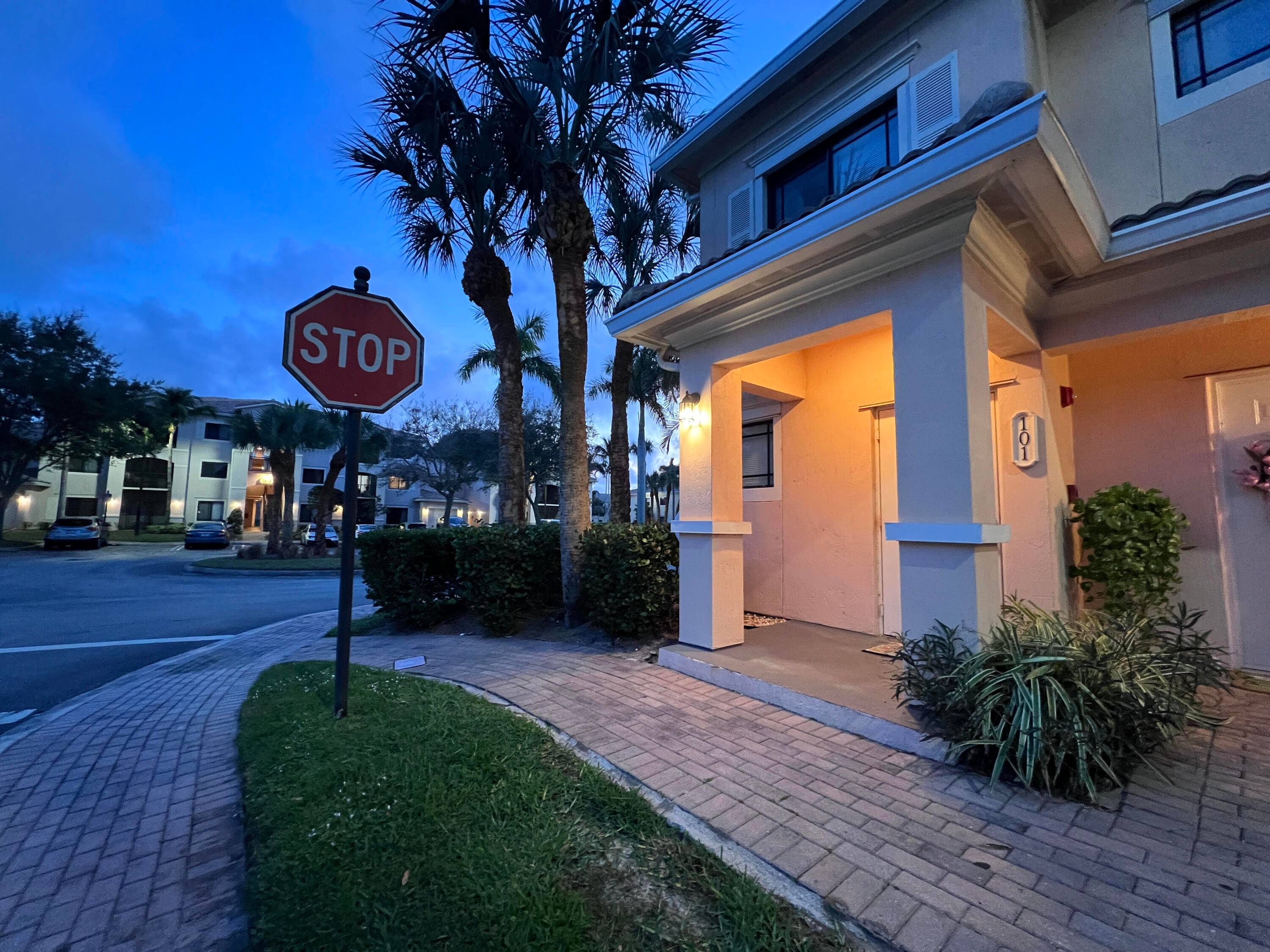 This is a corner unit with private entrance on first floor and interior stairs leading to the second floor living space.