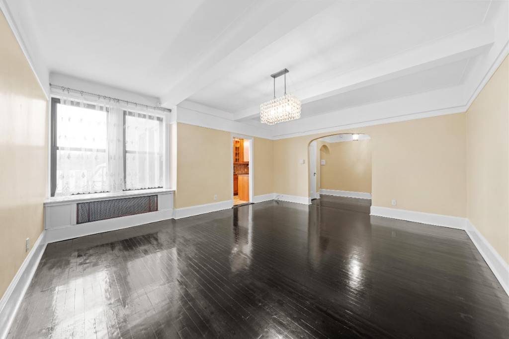 Situated within the picturesque confines of Kew Gardens, this exceptional pre war cooperative residence is situated on a high floor, mid block within one of the towns most charming buildings.