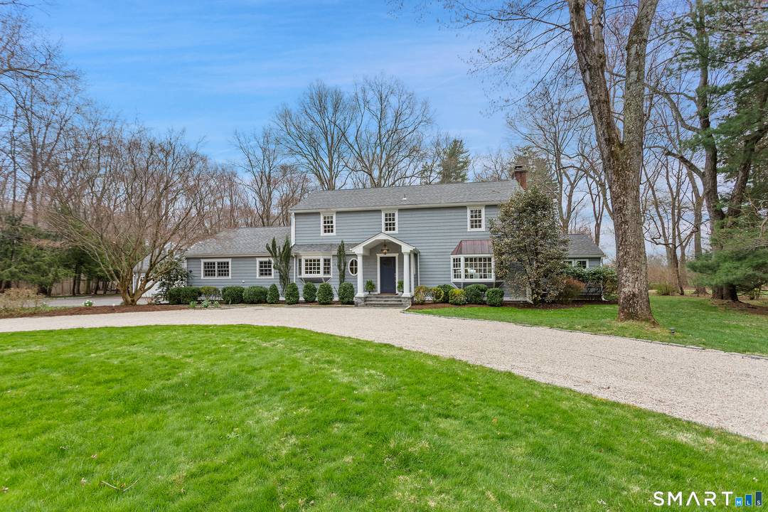 This is the One ! A beautifully updated four bedroom Colonial set on a quiet street in coveted North Darien, offering the perfect blend of classic charm and modern living.