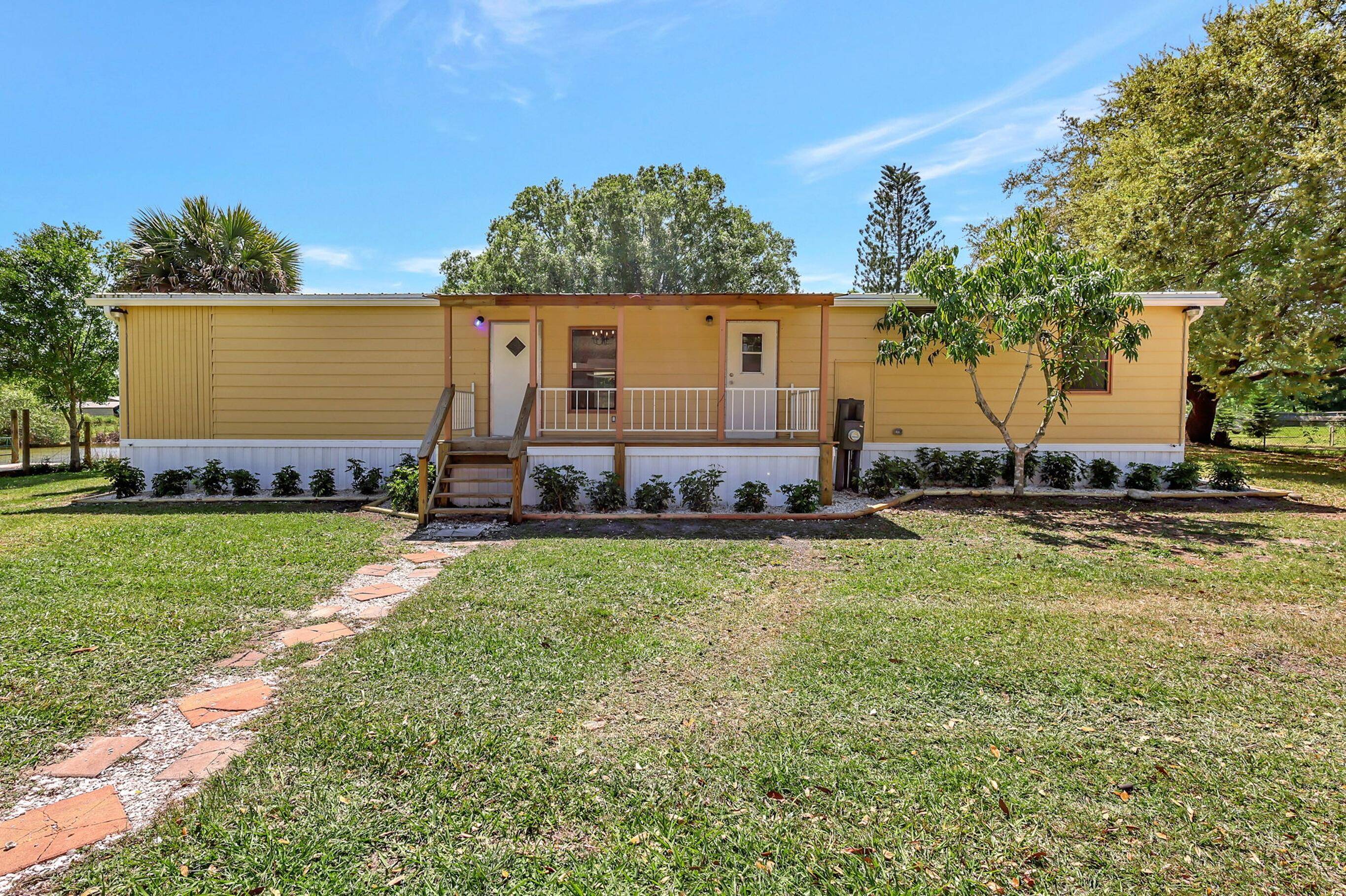 SECLUDED AND FULLY UPDATED 3BD 2BA MOBILE HOME, 1 ACRE, COMPLETELY FENCED AND ACCENTED WITH 100 YEAR OLD OAK TREES, MAKES FOR A SERENE AND RELAXING LIVING EXPERIENCE !