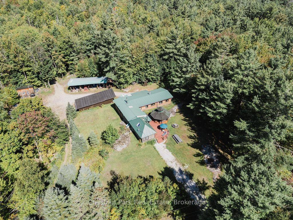 Discover this Muskoka rustic retreat, set on a stunning 10.