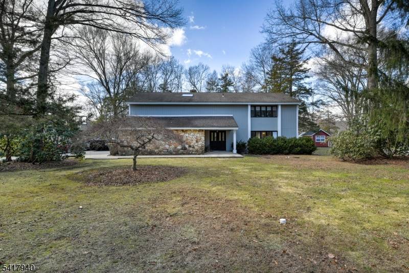Rare opportunity ! Beautifully maintained 5 bedroom colonial set on one of Boonton Township's most sought after streets, backing to preserved farmland for exceptional privacy.