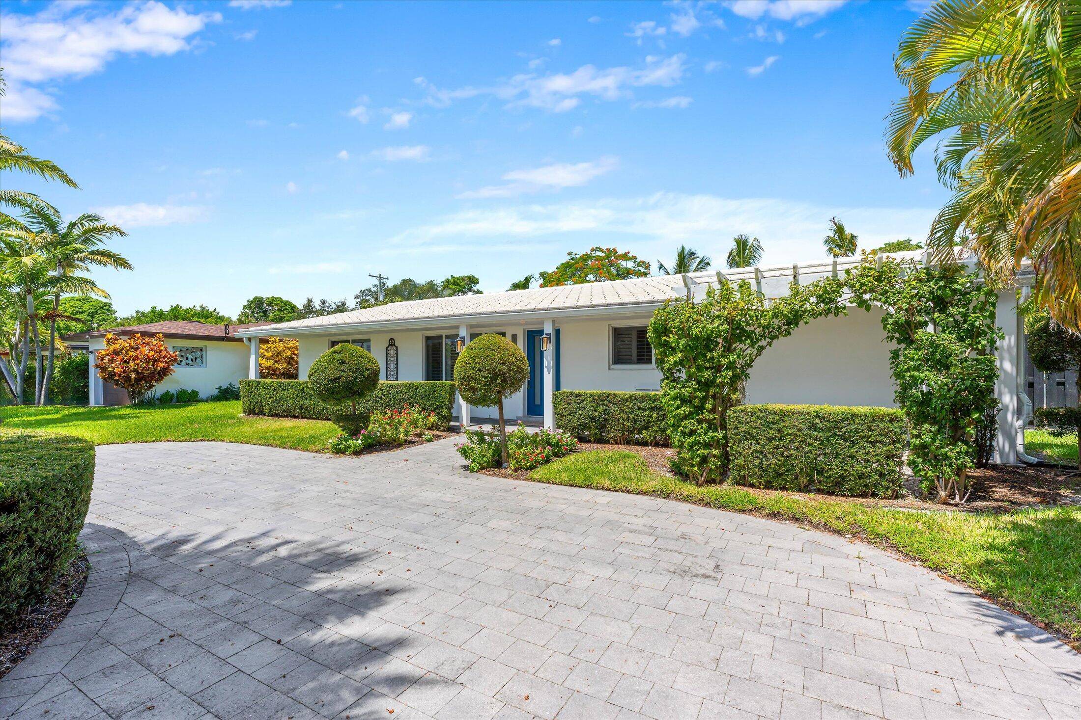 Charming one story 3 bed 2 bath home in Varsity Heights Spanish Village in East Boca !
