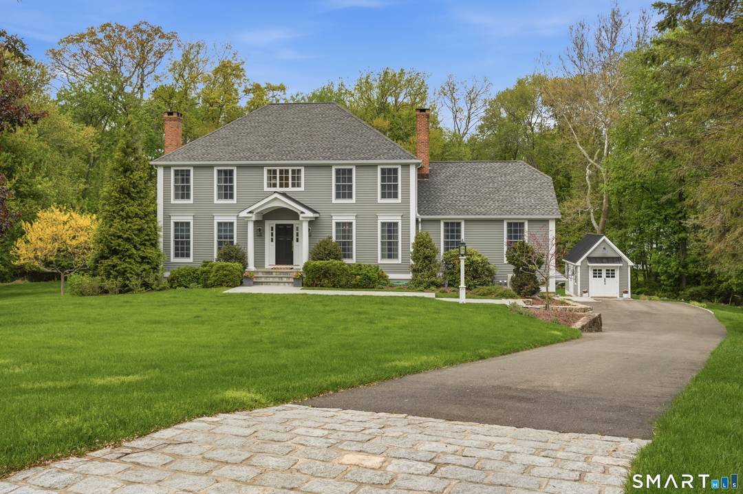 Welcome to 42 Anvil, your dream home in a coveted Southport neighborhood of quiet roads and cul de sacs where a slower, richer lifestyle awaits.