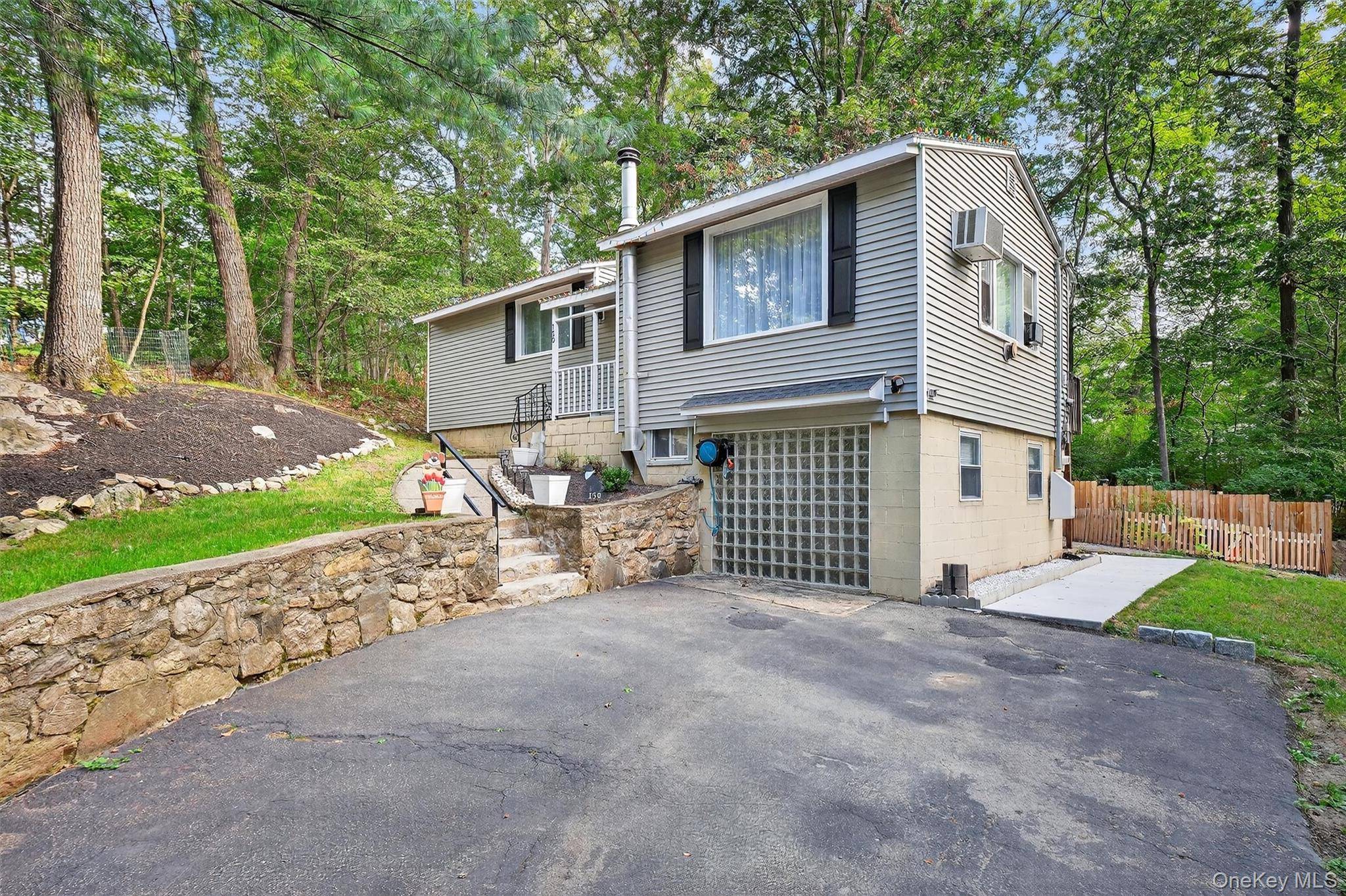 Discover the charm of Lake Peekskill living in this inviting 2 bedroom, 1.