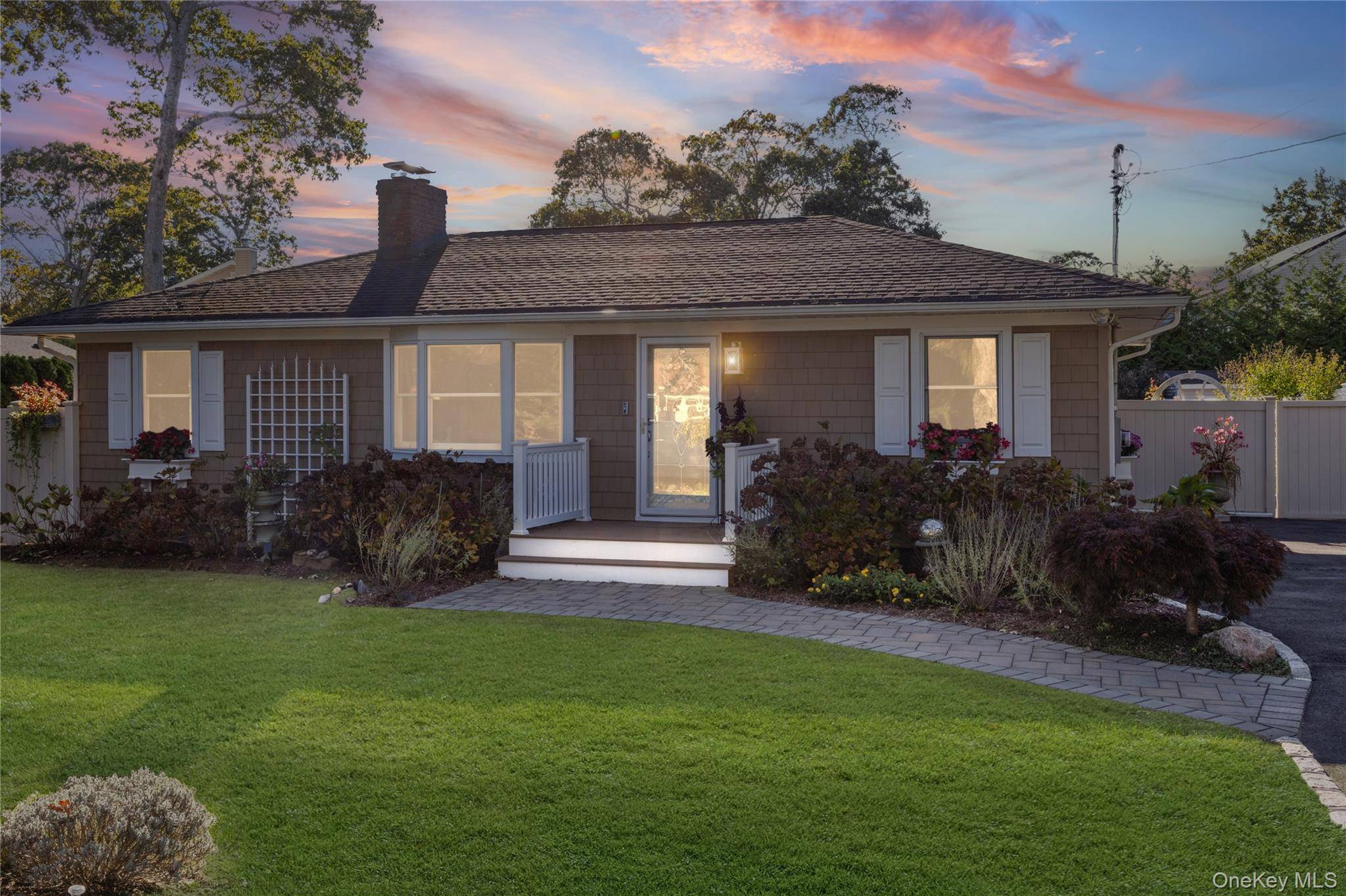 Stunning Renovated Home in the Desirable Holiday Beach Community offers modern luxury and coastal charm in this sought after neighborhood.