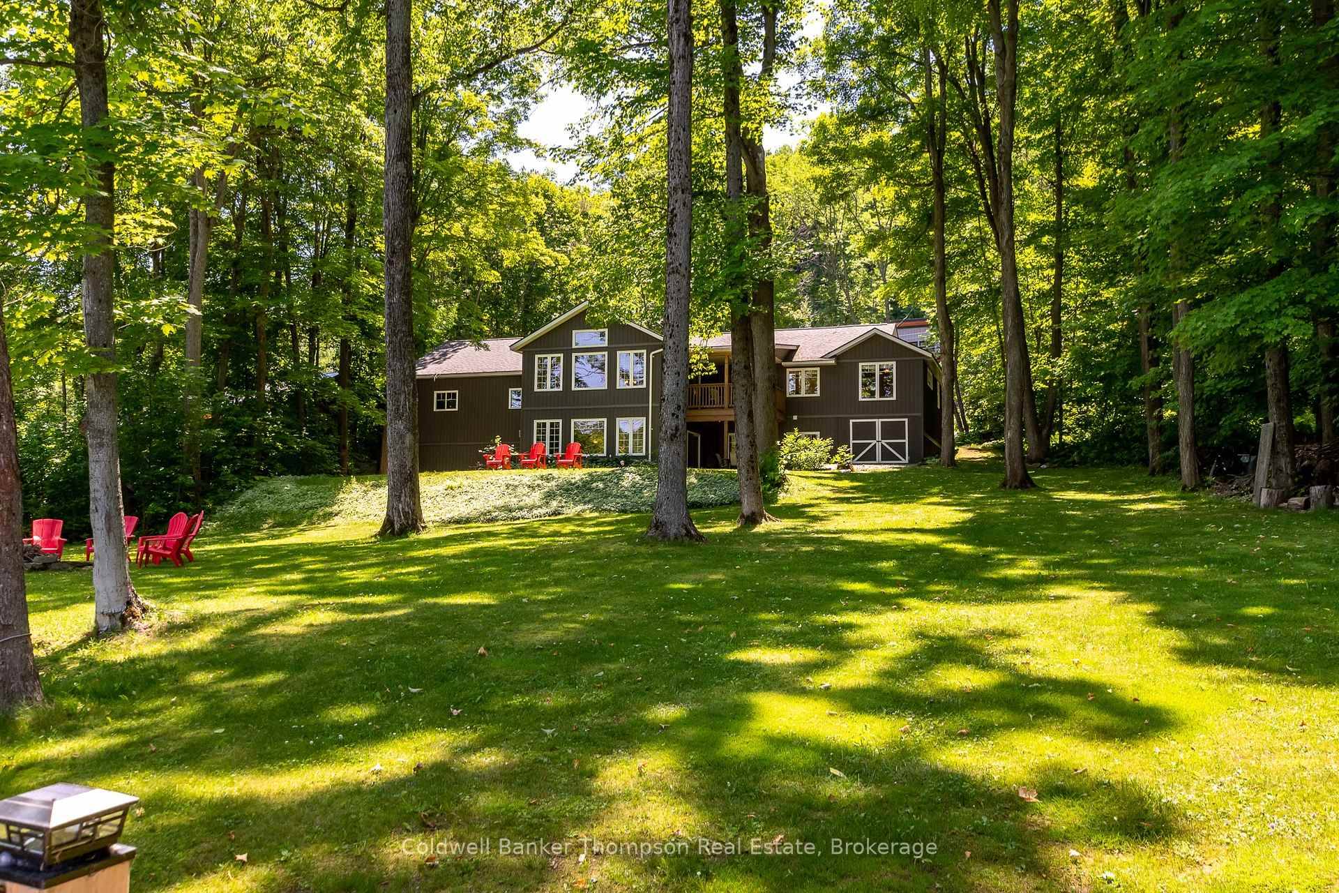 Welcome to this stunning waterfront bungalow offering luxurious living.