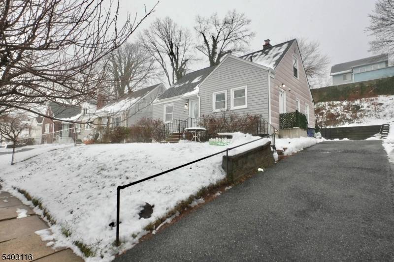 Cape Cod home in a prime Belleville location, minutes from shopping centers, dining, and everyday conveniences, and close to Nutley.