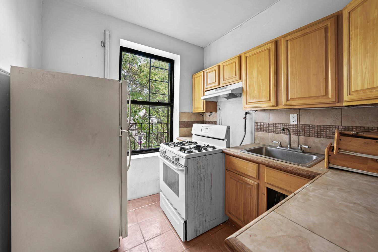 A legal 3 family building in East Flatbush featuring three full floor units, each with 3 bedrooms 1 bath plus a full basement.
