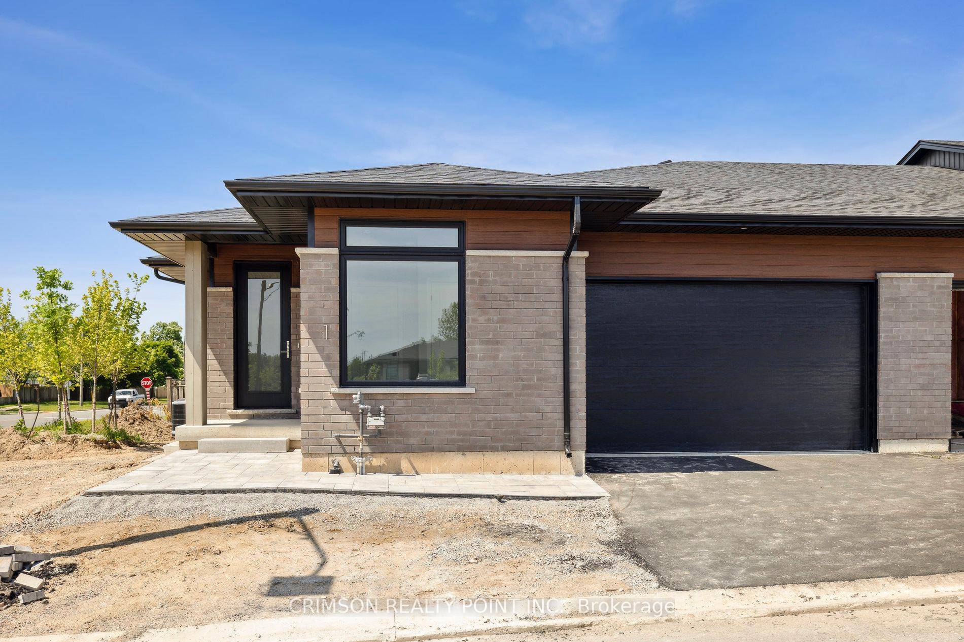 Welcome to this beautiful 2 bedrooms 2 full bathroom, main floor laundry end unit luxury bungalow townhouse located in Serene Richmond Woods in Thorold.