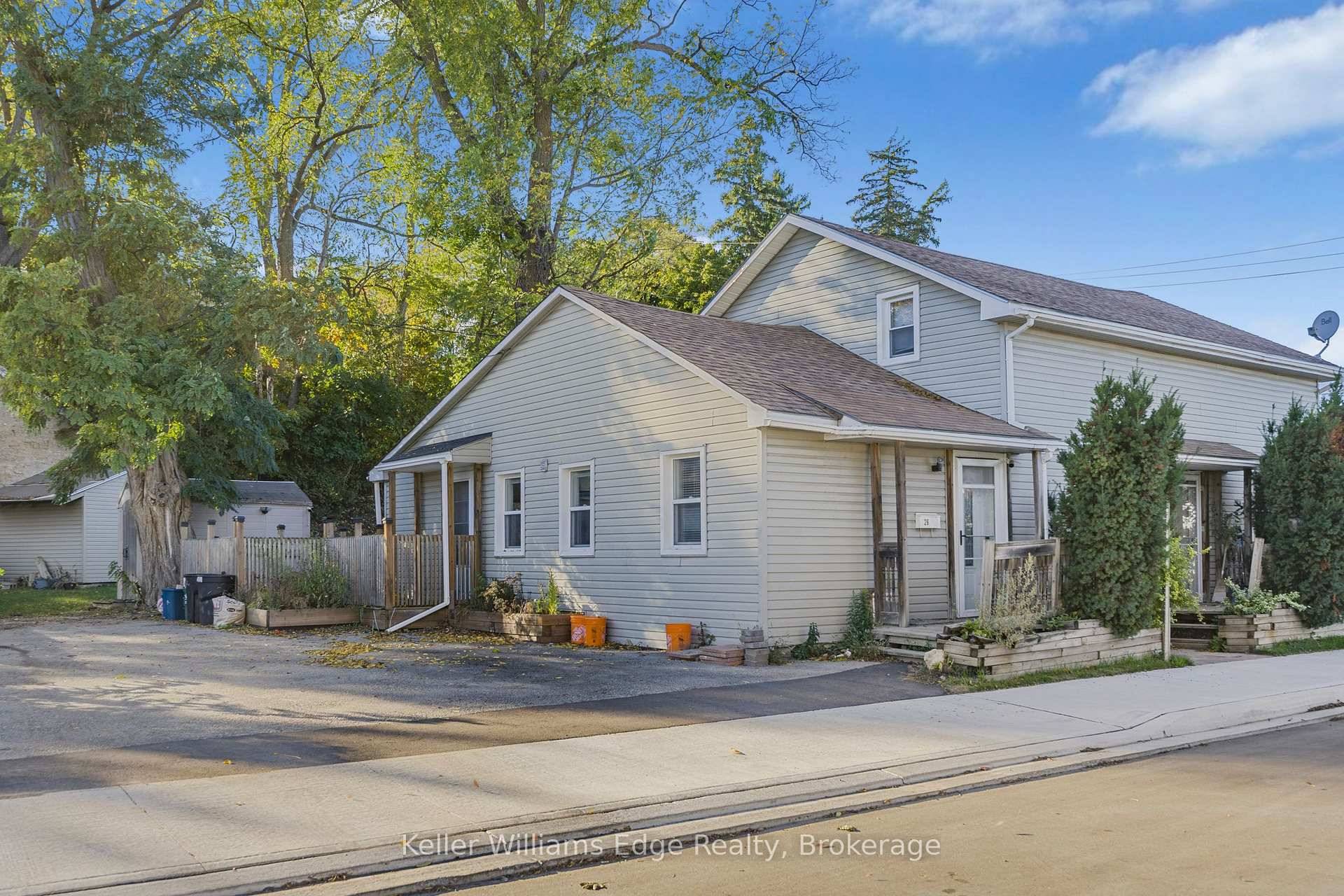 Discover this inviting main floor 2 bedroom, 1 bath home located in a quiet triplex in the desirable West Galt neighborhood, complete with two parking spaces.