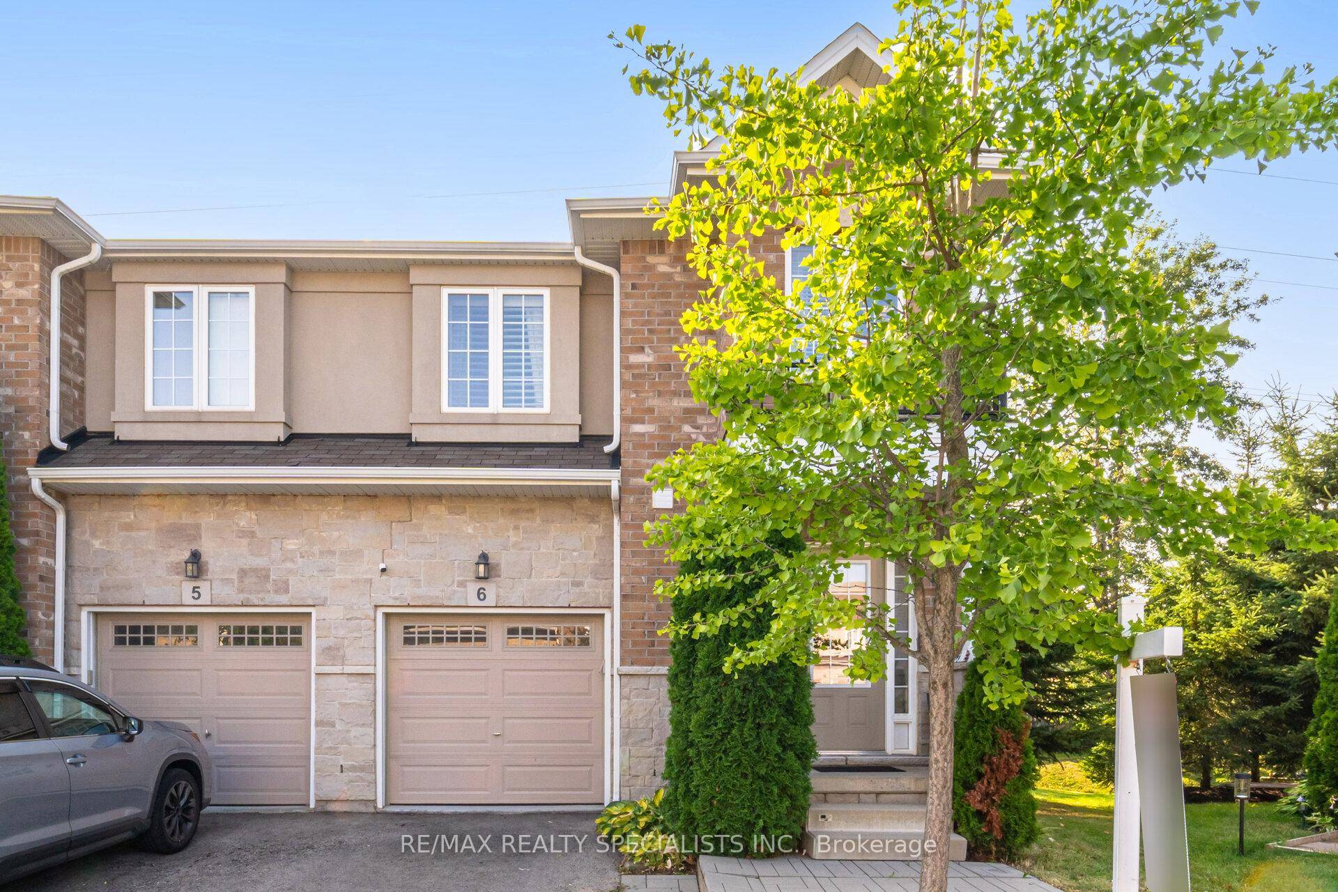 Welcome to this Beautifully Appointed End Unit with Stylish, Sophisticated Finishes.