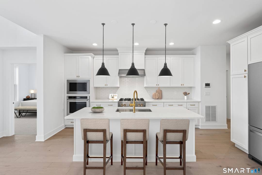 Fall 2026 Move In End Unit Walkout Basement The Mohonk Elite at 2 Elmwood Court offers the rare combination of thoughtful design, natural light, and a fully curated interior, without ...