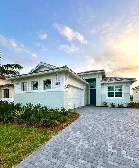 Come and experience luxury in this stunning lakefront one story Lila model home, in the prestigious PGA Village Verano.