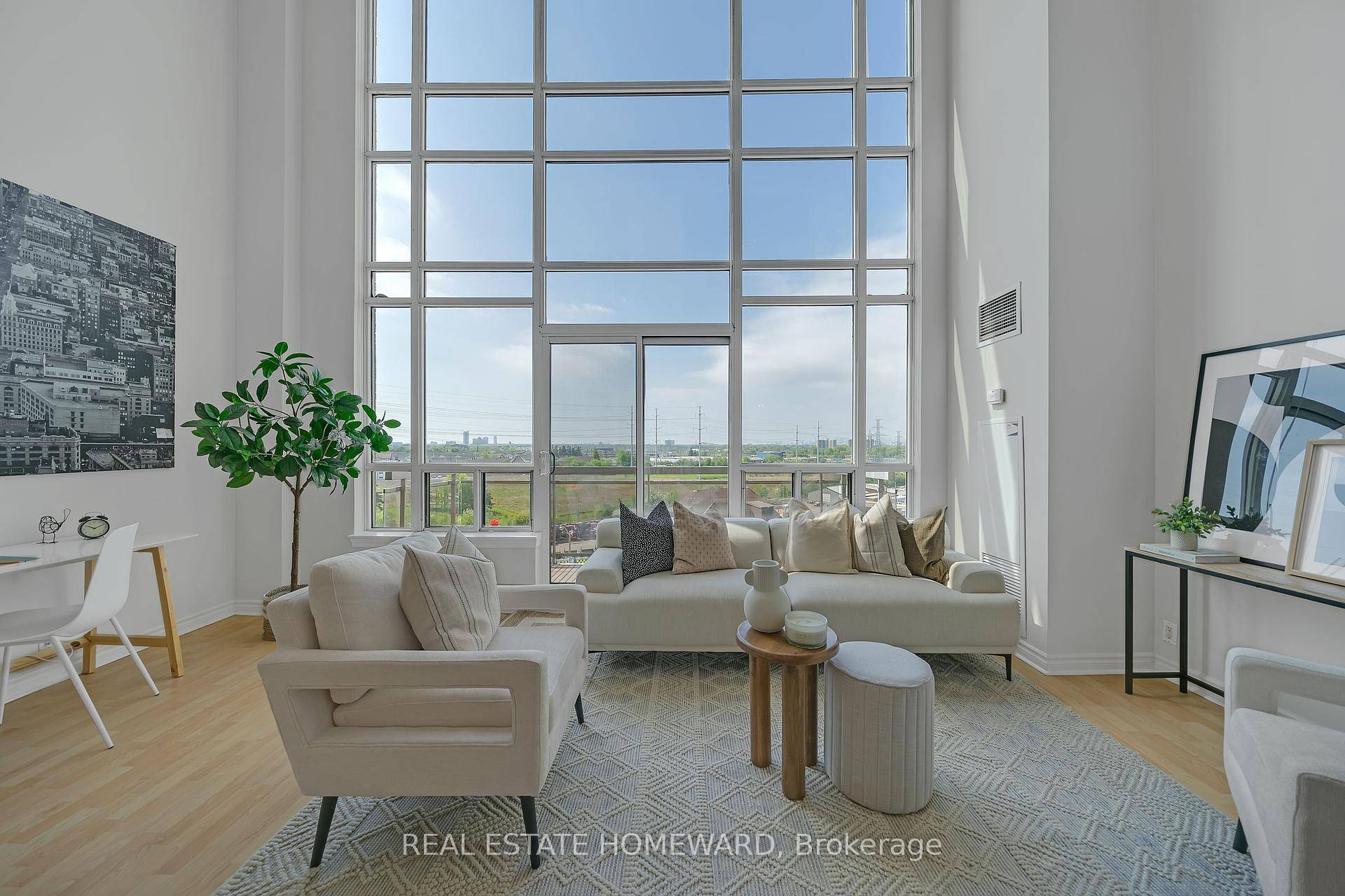 Welcome to this stunning, bright, 2 storey Loft, open concept design enhanced by soaring 18 ft floor to ceiling windows.