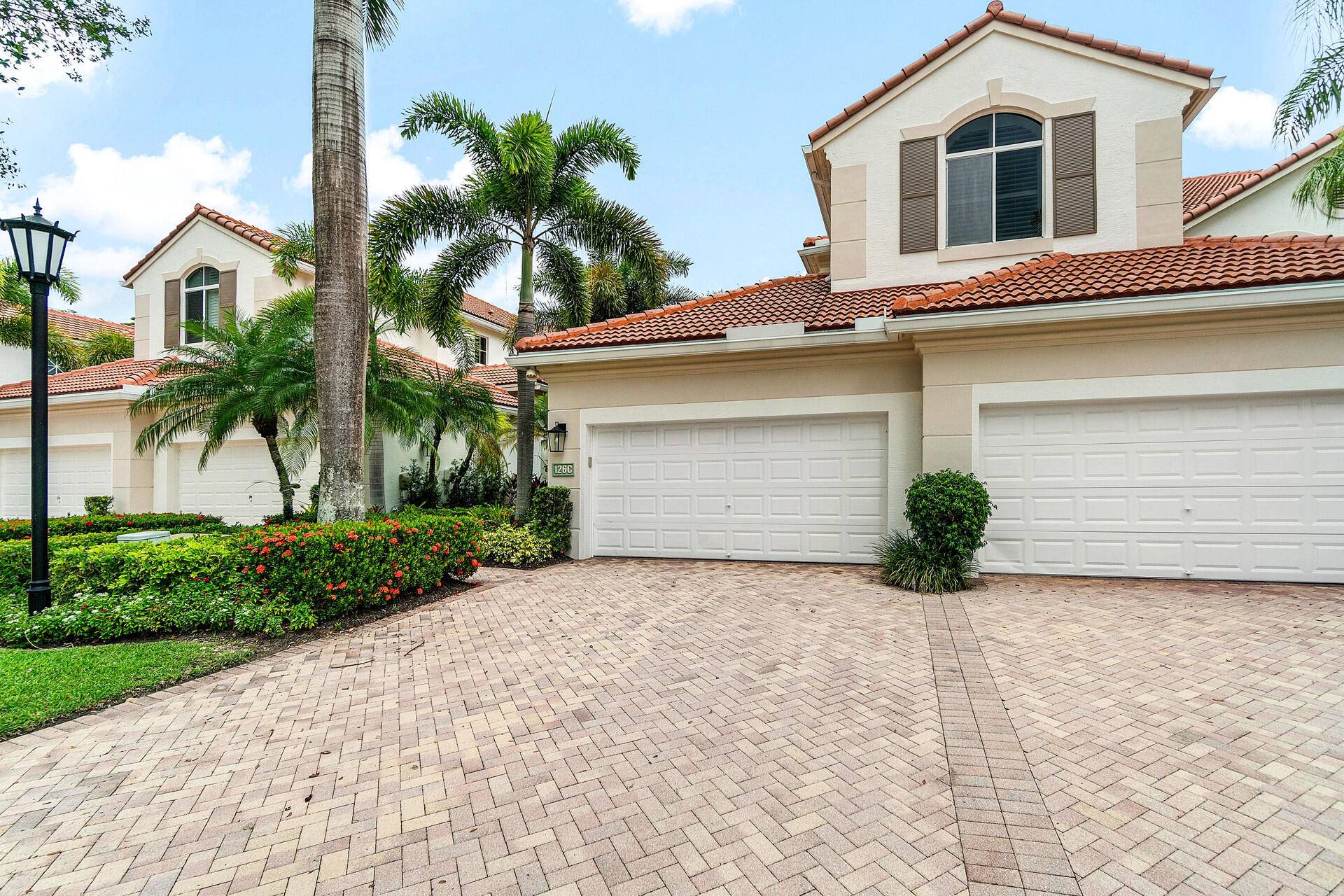 Spectacular and spacious 3 Bedroom, 3 Bath Condo plus Den in Ballenisles Country Club offers the perfect blend of luxury and carefree living.