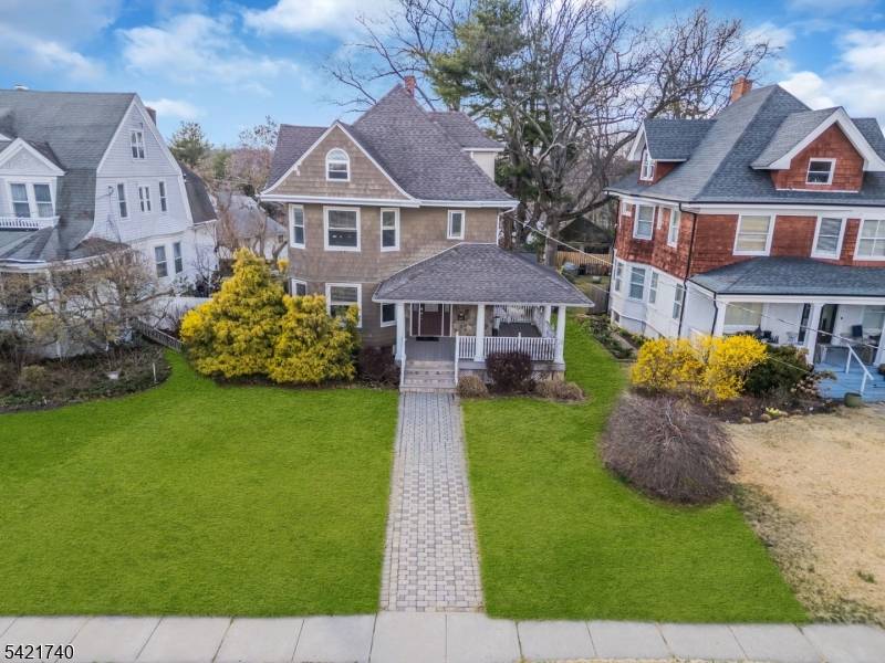 Welcome to this move in ready Victorian style home with an expansive wraparound porch, perfect for entertaining.