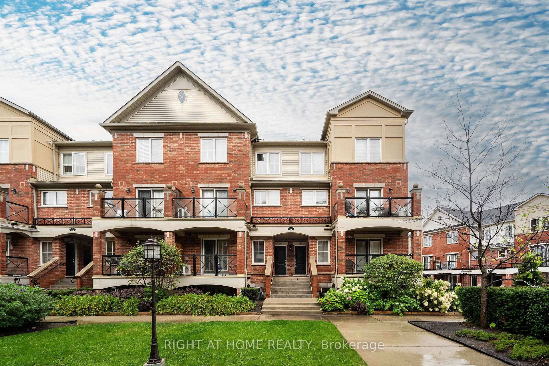 Stylish 2 bedroom main level unit in Oakvilles sought after Uptown Core !